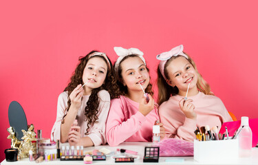 happy childrens day. three friends with happy face. smiling girls friends have fun on spa beauty...