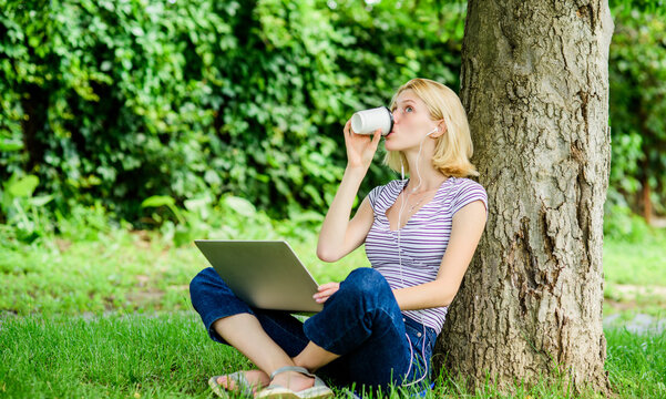 Girl work with laptop in park. Lunch time relax or coffee break. Work in summer park. Reasons why you should take your work outside. Nature is essential to wellbeing and ability to be productive