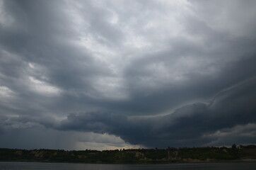 Fototapeta na wymiar Stormy sky over the Ob river. Beautiful clouds