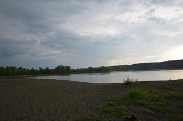 Stormy sky over the Ob river. Beautiful clouds