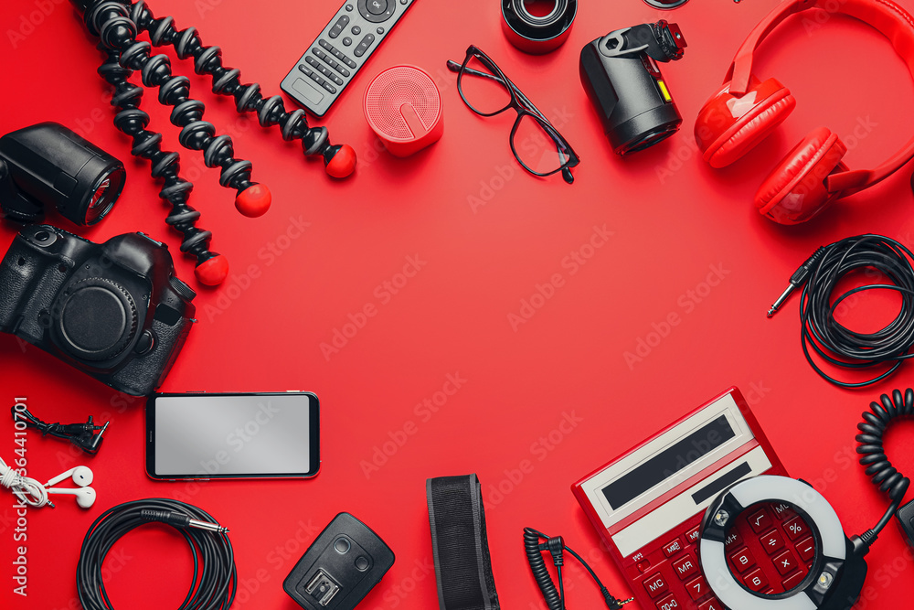 Wall mural frame made of different modern devices on color background