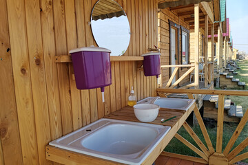 Fototapeta na wymiar outdoor wash basin and mirror, outdoor recreation