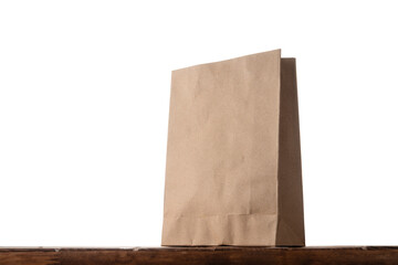 Paper bag on the table with isolated background