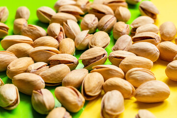 fried pistachios with salt close-up