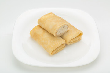lengths stuffed on a white plate white background
