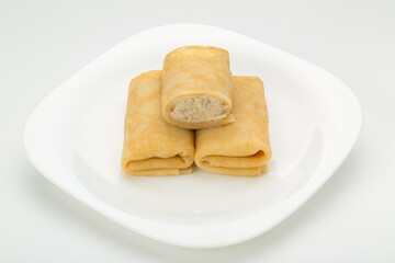 lengths stuffed on a white plate white background