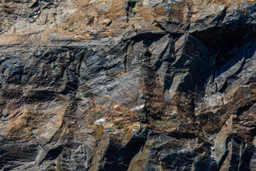 Texture of the stone with layers of iron ore