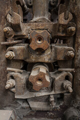 Old rusty steel rolling machinery.