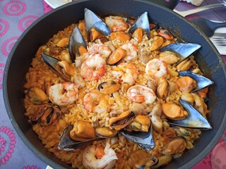 seafood paella in a pan