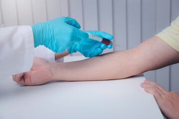 Doctor or Medical staff collect blood samples from patients infected with the coronavirus or COVID-19. for examination in the lab. Pandemic Coronavirus, COVID-19.