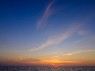Obraz premium Beautiful seascape with motion blur sky and sea at sunset background.Nature composition.