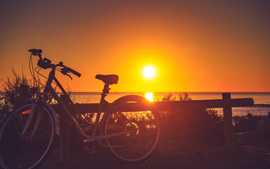 Fototapeta premium Bicycle on beach, active lifestyle.