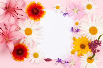 Garden flowers frame over pink