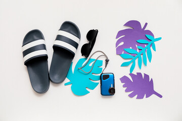 Composition with beach accessories on white background