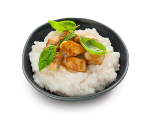 Bowl with boiled rice and chicken on white background