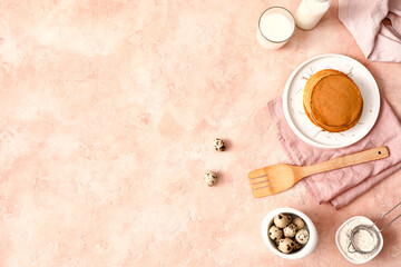 Fototapeta na wymiar Tasty pancakes with ingredients on color background