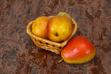 Pear heap in the wooden basket