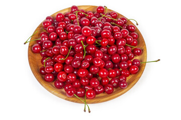 Freshly picked sour cherries on the rustic wooden dish © An-T