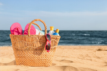 Bag with beach accessories at resort