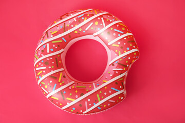 Inflatable ring on color background