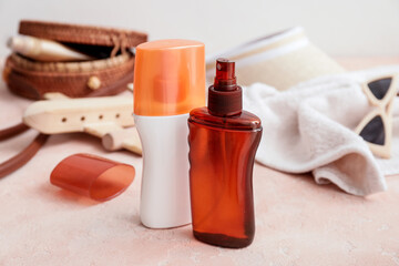 Bottles of sunscreen on table