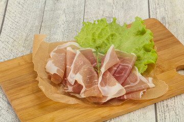 Italian prosciutto pork meat over board