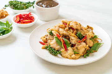 stir fried holy basil with fish and herb