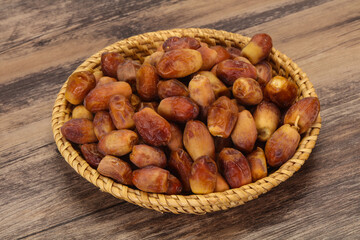 Sweet tasty dry dates in the basket