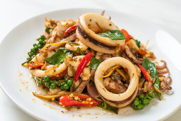 stir fried holy basil with octopus or squid and herb