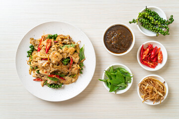 stir fried holy basil with fish and herb