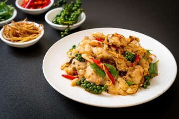 stir fried holy basil with fish and herb