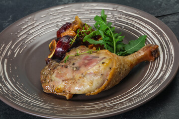 Roasted. duck. leg with plum and apple