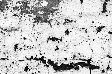 Fototapeta premium Texture of a concrete wall with cracks and scratches which can be used as a background