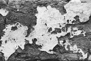 Texture of a concrete wall with cracks and scratches which can be used as a background