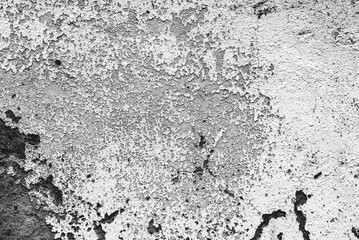 Texture of a concrete wall with cracks and scratches which can be used as a background
