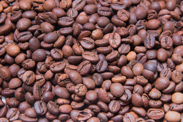 background made of coffee beans. brown roasted coffee