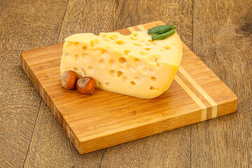 Maasdam cheese - yellow triangle with holes