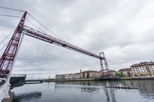 Ultra Wide view closeup of the Bizkaia suspension bridge and boat