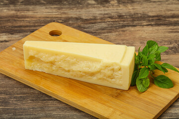 Hard parmesan cheese served basil