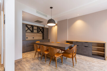 Interior of a dining room in modern hotel apartment