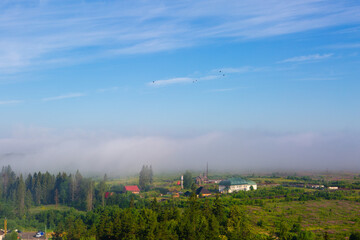 Fog in the village at dawn