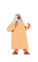 arabic man in traditional clothes arab businessman using smartphone male cartoon character standing pose full length isolated vertical vector illustration