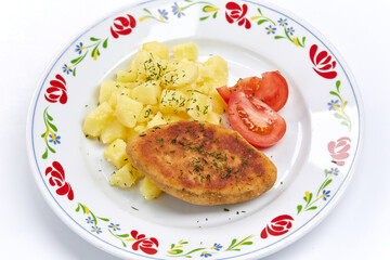 cutlet with mashed potato on white plate