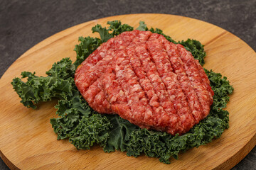 Raw beef burger cutlet for cooking