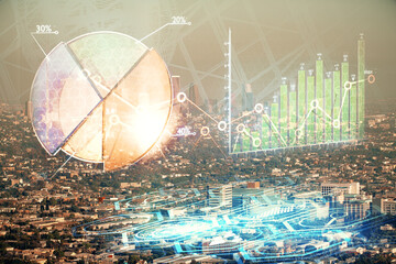 Forex chart on cityscape with skyscrapers wallpaper double exposure. Financial research concept.