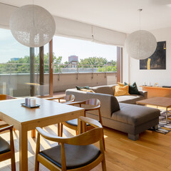 Living room with window open to terrace