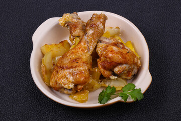 Roasted chicken legs with potato