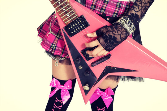 Cropped photo of female punk teen rocker