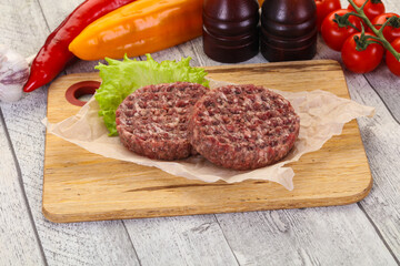 Raw burger cutlet