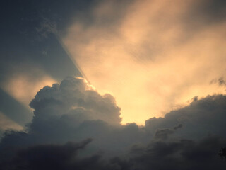 Sunset in sky and cloud, light rays. Nature composition.